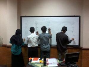 One of our first classes; students in one of my post-grad classes writing down all the verbs they can think of